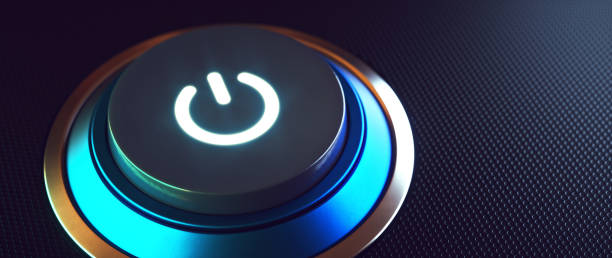 Extreme close-up on a start button concept model with a glowing on/off symbol.