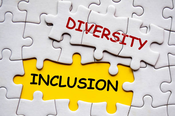 istock Diversity and Inclusion text on jigsaw puzzle. D and I concept 2199605419