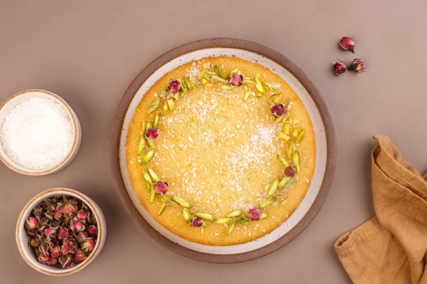 Basbousa is Egyptian Semolina Cake with Cream and Pistachio.