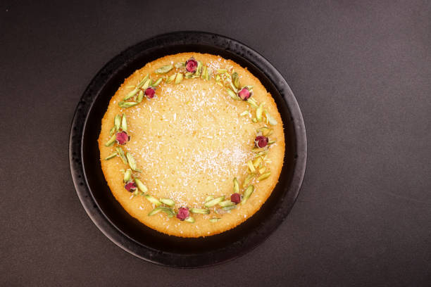 istock Basbousa is Egyptian Semolina Cake with Cream and Pistachio. 2199608698