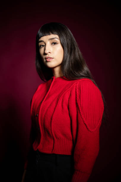 istock Portrait of woman with bangs and a blank expression 2199609312