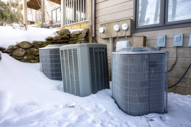 istock Condo Heating and Cooling - Heat Pump Compressors - Snow 2199617663