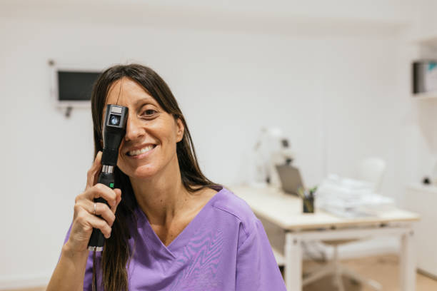 istock Optometrist performing retinoscopy examination in clinic 2199619480