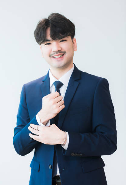istock Asian businessman isolated on white background,Smiling young handsome southeast Asian businessman in white studio isolated background. 2199621042