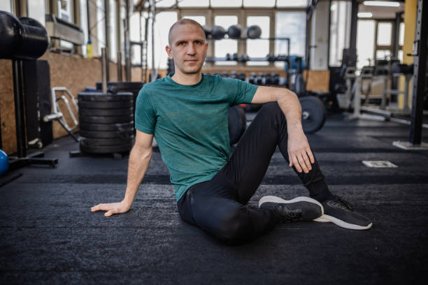 istock Focused training session in a gym with dedicated athlete applying strength and determination 2199623671