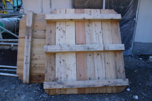 istock Wooden pallet stands upright on scaffolding 2199625493