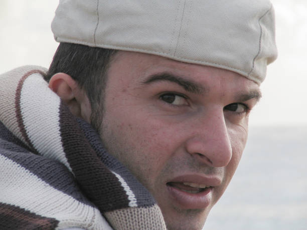 Close-up of a man and his Irish hat from behind