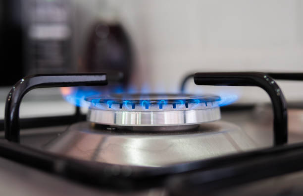 istock kitchen gas cooker. gas stove close up 2199635015