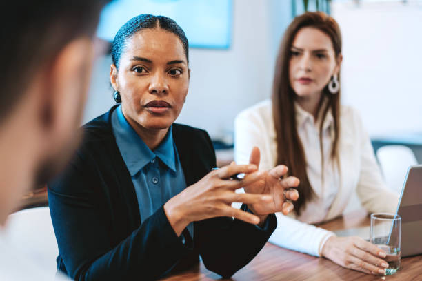 istock Small group of business people talking 2199638132
