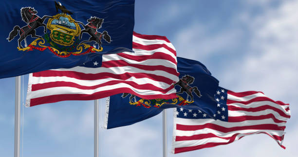 istock Pennsylvania state flags waving with the american flags 2199640676