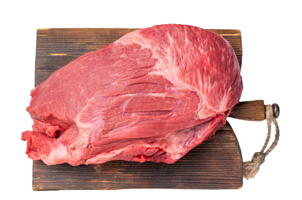 istock Fresh Raw Round Silverside beef meat cut, inside round with hrebs for roasting. isolated on white background. Top view 2199641634