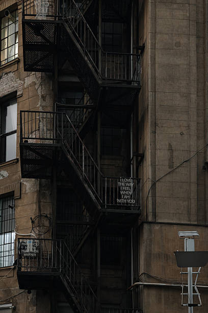 istock Ladder in a facade’s town 2199645005