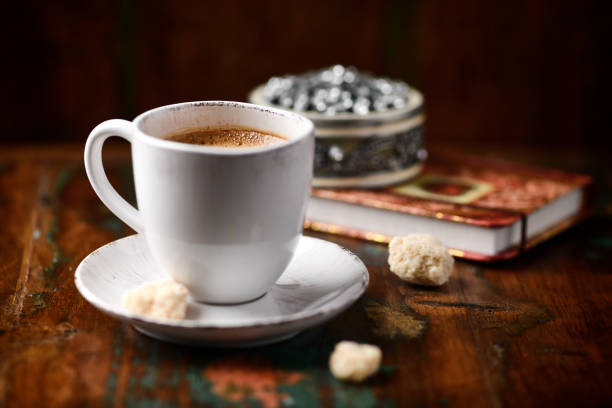 Cup of coffee on wooden background. Soft focus. Copy space.