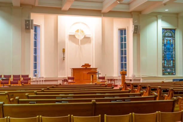 istock church interior view with wooden pews 2199648304