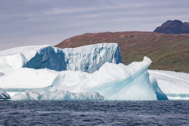 istock Kayaking in Tasiusaq ice fjord (South Greenland) 2199649055