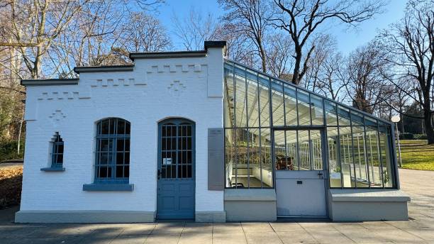 Stuttgart, Germany - 2/8/2025, Bad Cannstatt, Gottlieb Daimer park and museum. Here the automobile was invented in 1888. In the foreground the original workshop of Gottlieb Daimler visible, today a museum with free entrance.
