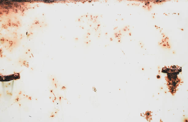 istock Rust of metals plate texture with nuts weathered. Corrosive grunge rusted on iron. The pattern of grunged rust on white background use as illustration.Rusty corrosion and oxidized background. 2199655033