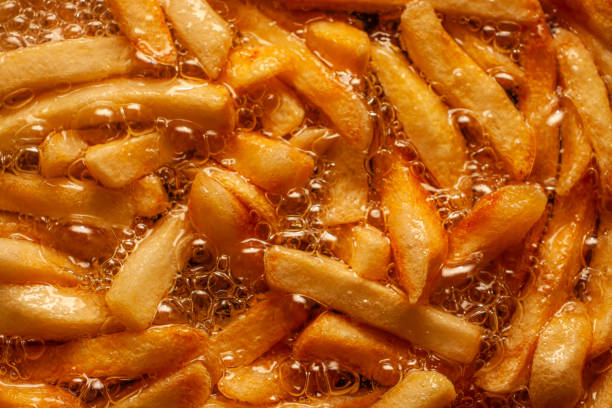 istock frying fries, junk food 2199662885