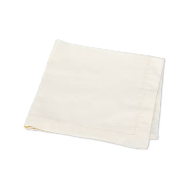 istock Folded light beige tissue napkin isolated over white background 2199671047