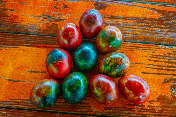 Easter, spring holiday, this year, the Catholic and Orthodox Churches celebrate Easter on the same day, beautiful colorful Easter eggs, home tradition of decorating with colors, still life,