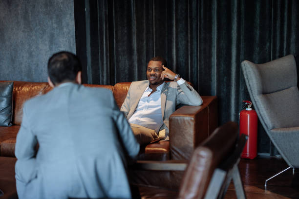 istock Business Professionals Engaging in Casual Conversation 2199672521