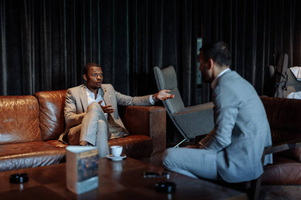 istock Business Professionals Engaging in Serious Discussion 2199672535