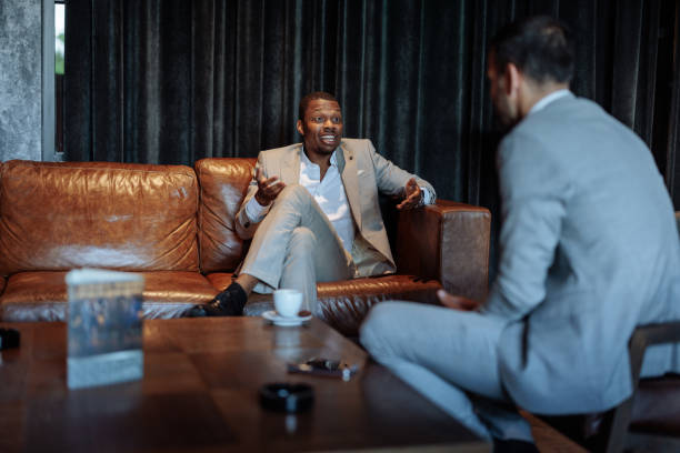 istock Business Professionals Engaging in a Serious Discussion 2199672536