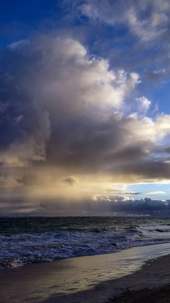 Clouds, sea, ocean, sand, water.