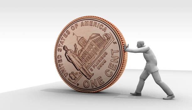 A photograph of a lucky penny in a womans hand.