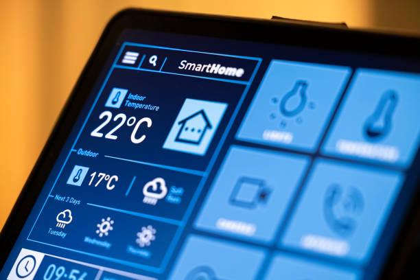 istock Smart Home Control Tablet in Modern Living Room at Night 2199676851
