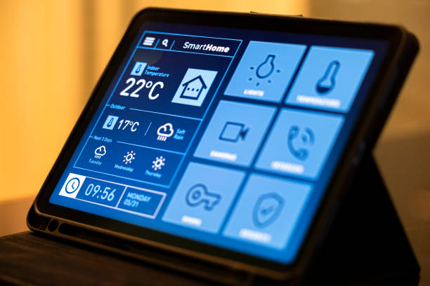 istock Smart Home Control Tablet in Modern Living Room at Night 2199676864