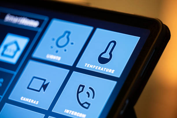 istock Smart Home Control Tablet in Modern Living Room at Night 2199676896