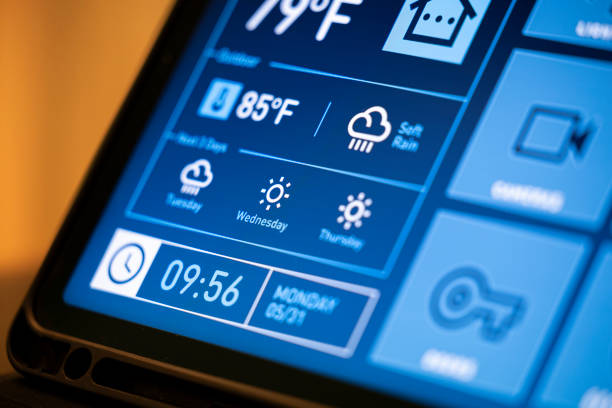 istock Smart Home Control Tablet in Modern Living Room at Night 2199676903