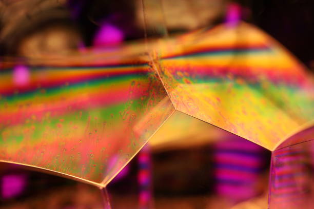 Colour surfaces, deep dark backgrounds, geometric shapes, beautiful physical phenomenon
