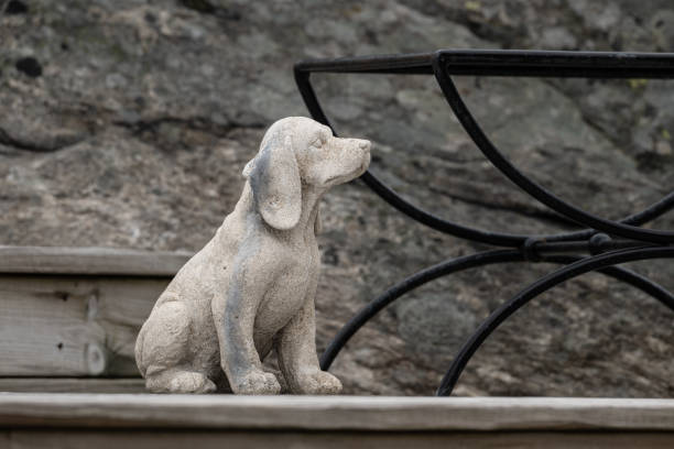 istock Small cast concrete god on a porch.. 2199680426