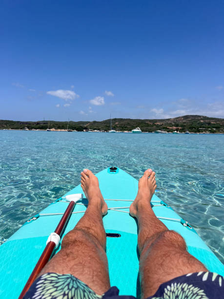 istock Relaxed Man Kayaking in Clear Tropical Waters 2199685522