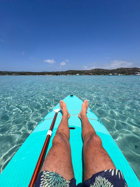 istock Relaxed Man Kayaking in Clear Tropical Waters 2199685534