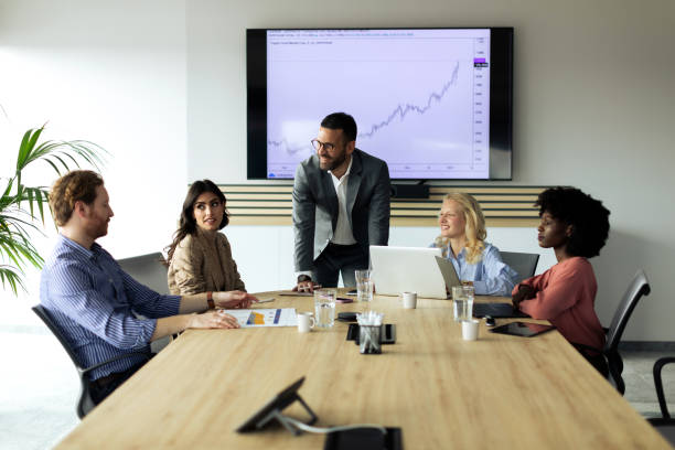 istock Business team sitting in the office and working 2199699176
