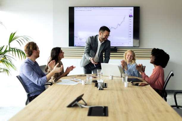 istock Business team sitting in the office and working 2199699674