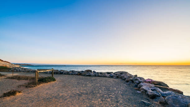 istock Christies Beach coastline with Witton Bluff trail at dusk 2199699744