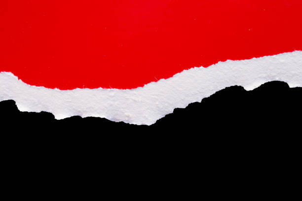 istock Red ripped paper torn edges strips isolated on black background 2199699782