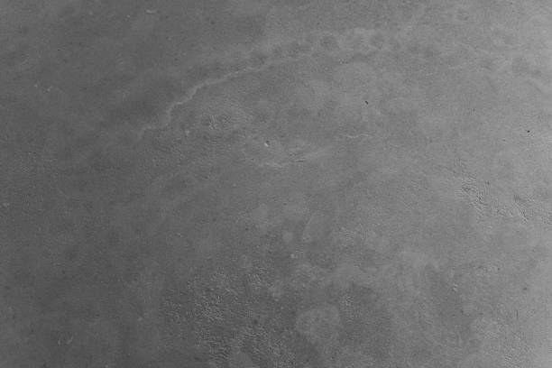 istock Texture of a weathered surface in monochrome tones captured in natural light 2199699891
