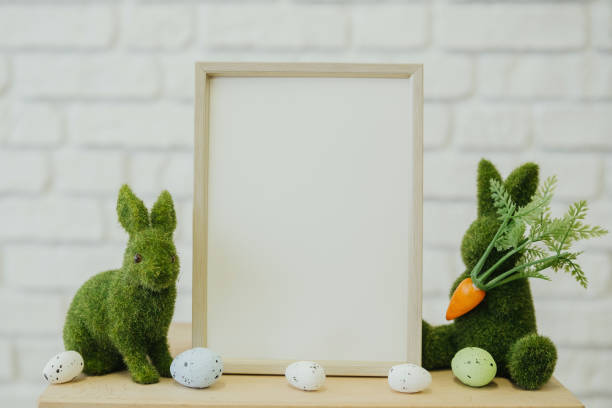 istock A spring-themed arrangement with green bunny decorations and pastel eggs 2199700009