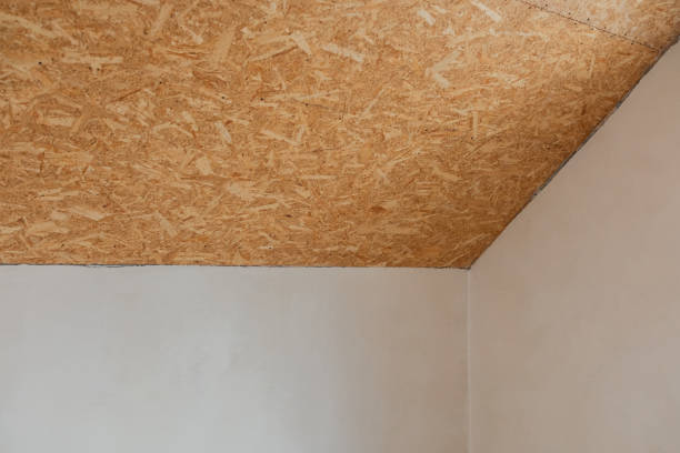 istock Room with an OSB ceiling and unfinished walls is under construction 2199700103