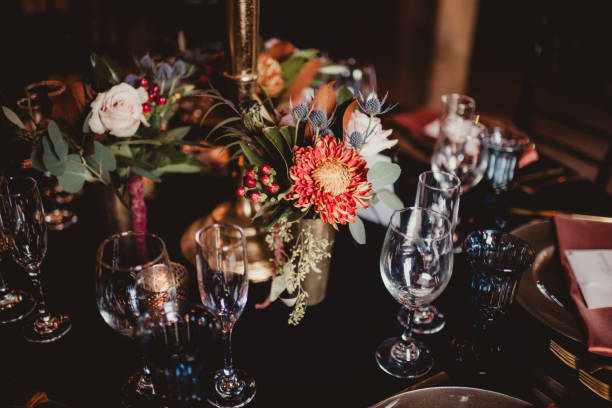 istock Table decorations and flower centerpiece at wedding reception dinner 2199718653
