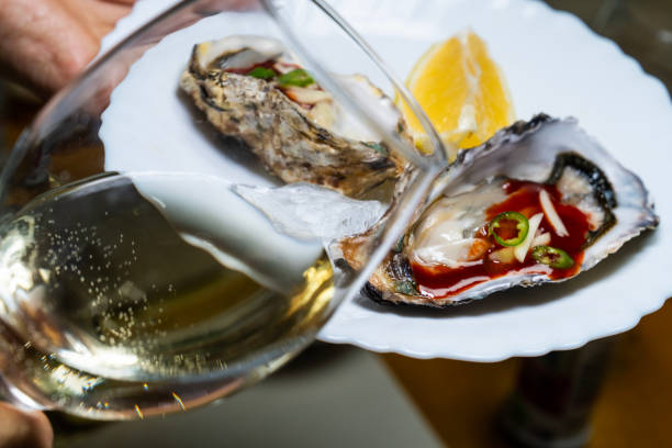 istock white wine at the raw oyster cuisine 2199722479