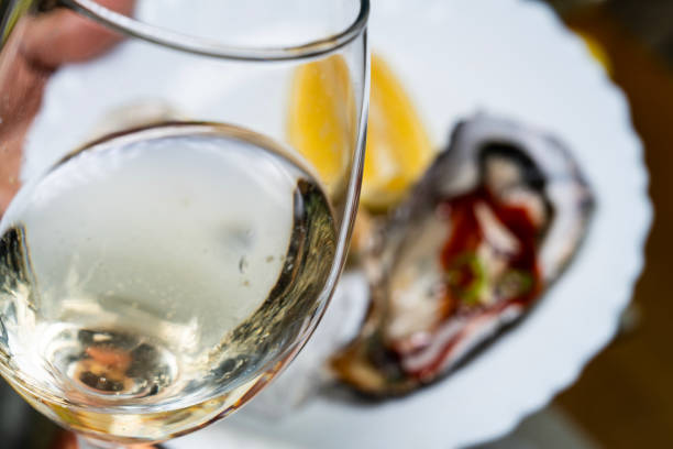 istock white wine at the raw oyster cuisine 2199722615
