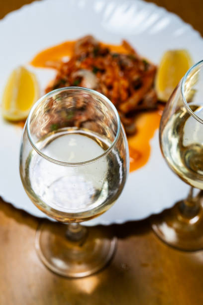 istock white wine at the spicy seasoned raw oysters 2199723443