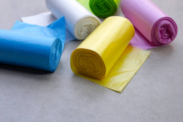 istock Colorful garbage bags on the tiled floor 2199732706