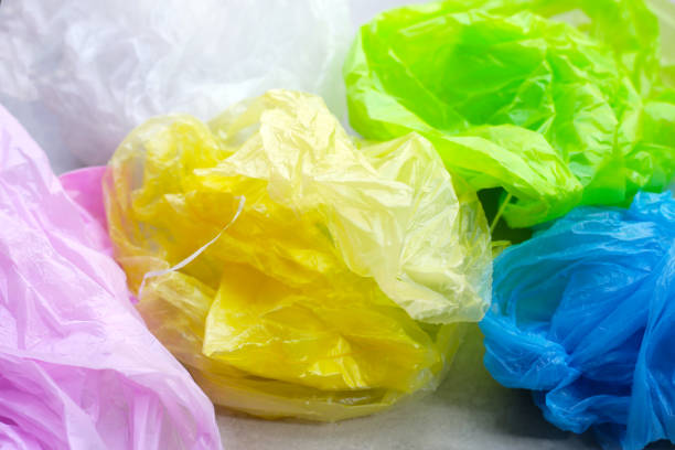 istock Colorful garbage bags on the tiled floor 2199733170